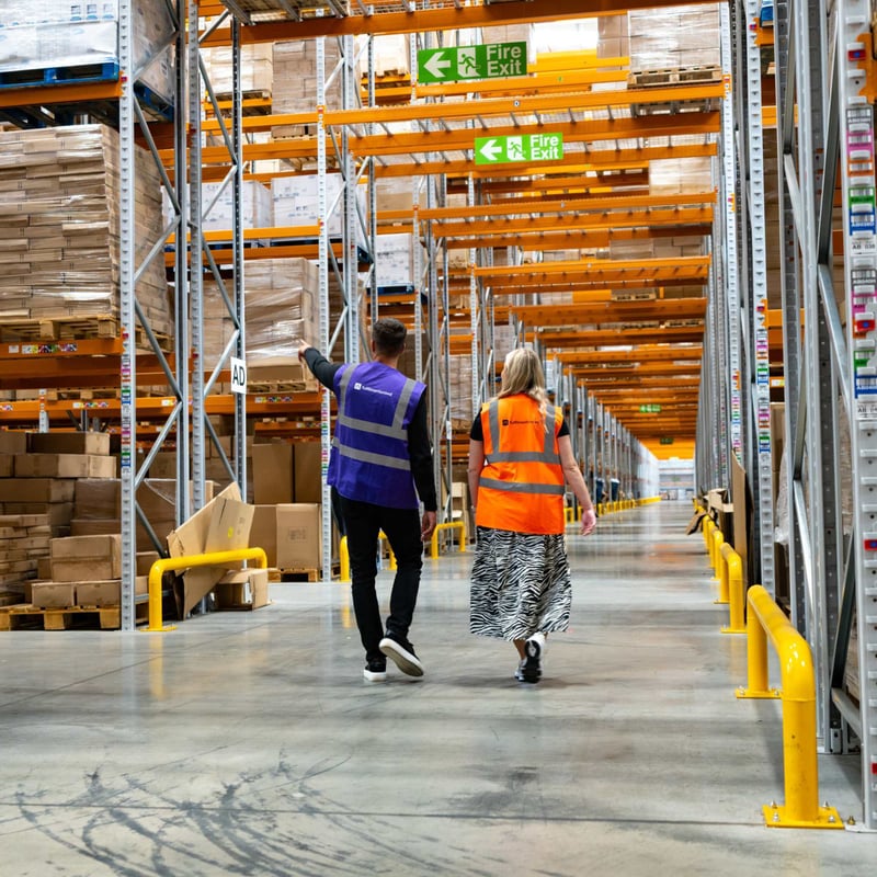 clients-walking-through-warehouse